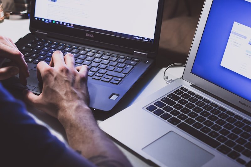 Technician optimizing and speeding up a slow laptop